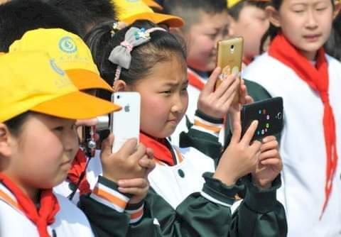 China bans use of mobile phones at classrooms over rising addiction among pupils