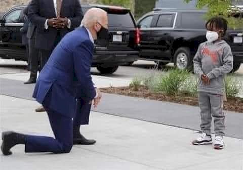 U.S. President Joe Biden on his kneel to beg George Floyd's son for forgiveness