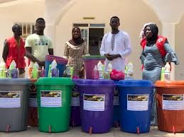 Fulbe Africa donated hand wash materials including buckets and detergents to The Gambia Red Cross Society for onward