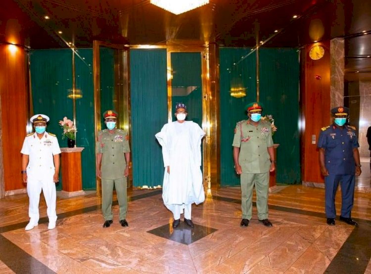 President Buhari charges new service chiefs