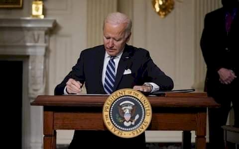 Biden revokes Trump’s immigrant visa ban