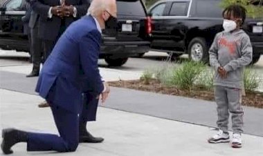 U.S. President Joe Biden on his kneel to beg George Floyd's son for forgiveness
