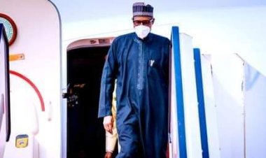 Buhari returns after two-week foreign trips, Garba Shehu defends borrowing spree