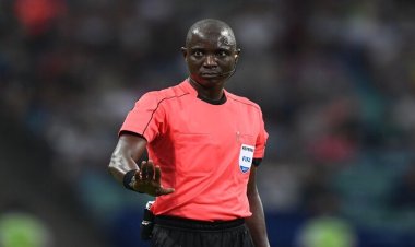 Gambian referee Bakary Gassama narrowly escapes the wrath of Algerian supporters while exiting country