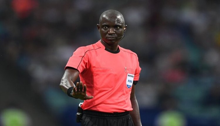 Gambian referee Bakary Gassama narrowly escapes the wrath of Algerian supporters while exiting country