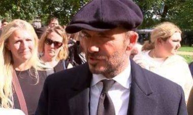 David Beckham joins thousands queuing for over 12 hours to view the Queen Lying in State
