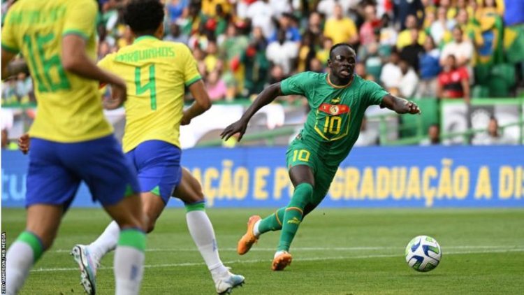 Former Liverpool forward Sadio Mane scored twice as Senegal beat Brazil in a friendly in Lisbon, Portugal.