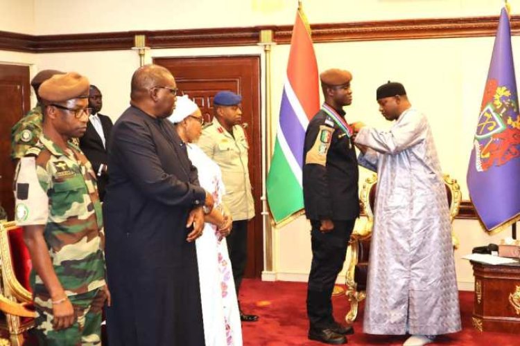 Barrow decorates outgoing State House Ecomig commander